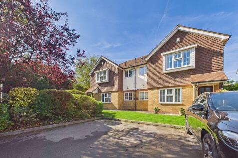 FRONT ASPECT FROM PARKING AREA