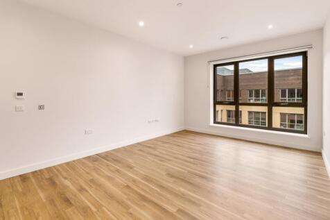 Embrace the potential of this bright urban living space, perfect for stylish city living.