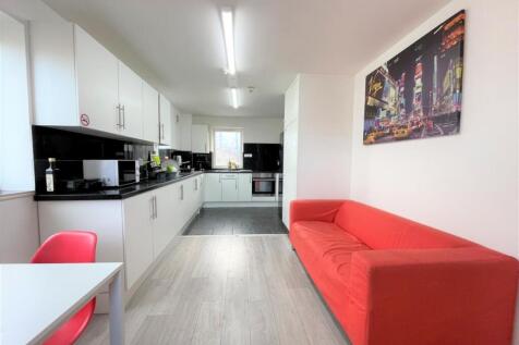 Bright, modern open-plan kitchen with long run ...