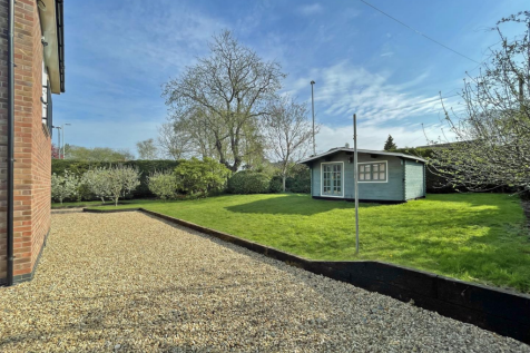 Generous Gardens wrapping round the property