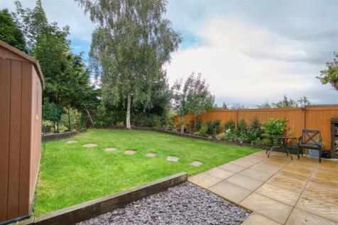 Rear Garden - lawn and flower beds.jpg