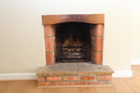 Open fireplace in the sitting room