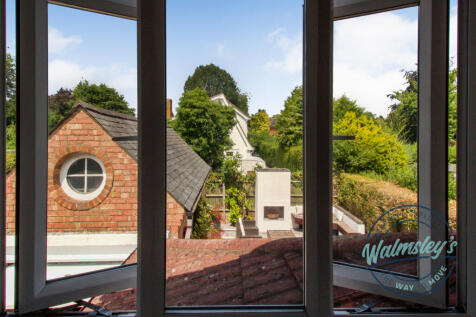 Rear garden & garage view