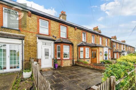 Three-bedroom mid-terrace family home with two reception rooms, ground floor bathroom, rear garden, parking space and large garage. Conveniently located close to local amenities and transport links.