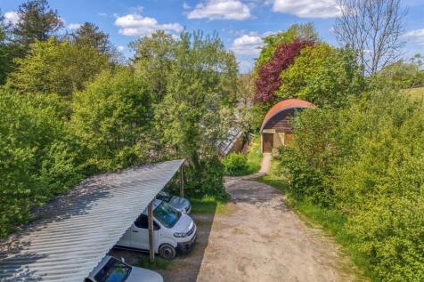 Second carport and Dutch Barn