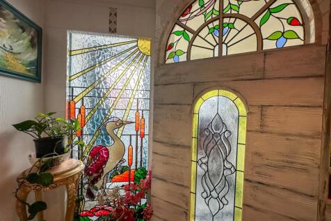 ALTERNATE VIEW OF RECEPTION HALLWAY