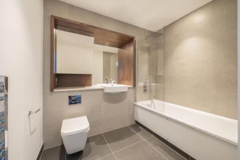 Experience elegance in every detail of this contemporary bathroom space.