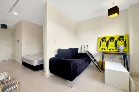 Modern open plan studio on 3rd floor with high gloss kitchen, built-in appliances, double bedroom, bright shower room, large windows. Popular Manor Mills location near city centre and motorways.