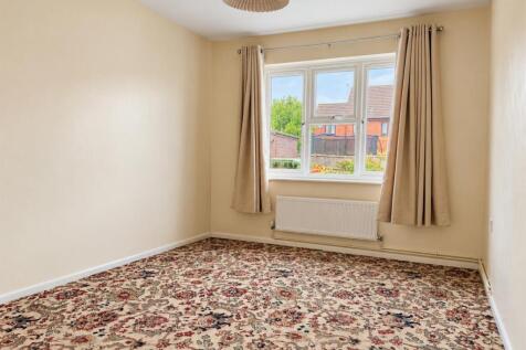 empty_cream_room_with_garden_view.jpg