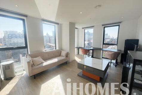 Welcome to this modern apartment located in the heart of Manchester, specifically at the prestigious Calico Building on Whitworth Street. This stylish residence boasts two well-proportioned bedrooms a