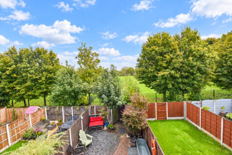Sunny Suburban Garden with Parkland Views