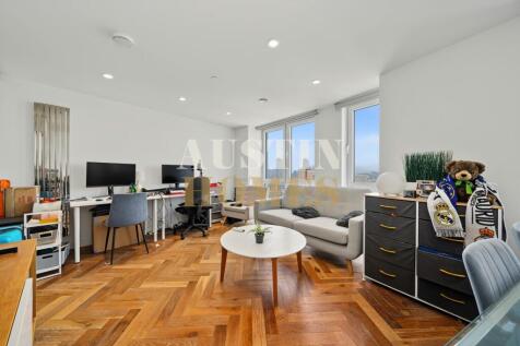 Modern 2-bed apartment with open-plan living, sleek kitchen, en-suite, onsite gym, concierge, and great transport links. Ideal for city living. Enquire now to arrange a viewing.