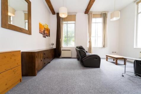 A magnificent apartment in a stunning period conversion located in the very heart of the city center. This large first floor corner apartment has an abundance of character and briefly comprises; spaci