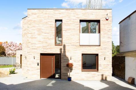 Beautiful five bedroom, four bathroom detached family home in a quiet corner of West Putney.