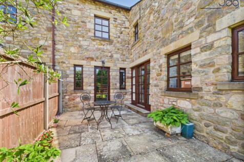 Patio seating area in the rear garden