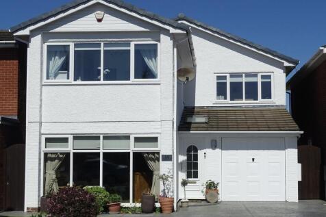 Front view with double drive and garden
