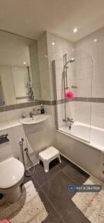 Bathroom With Large Mirror 