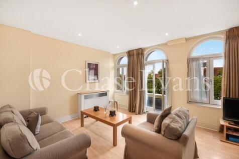 Modern two bedroom, two bathroom apartment with parking In this refurbished period mansion block. Features include a spacious open plan living area with a stylish kitchen fitted with integrated applia