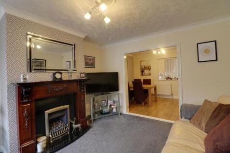 Lounge with a feature fireplace