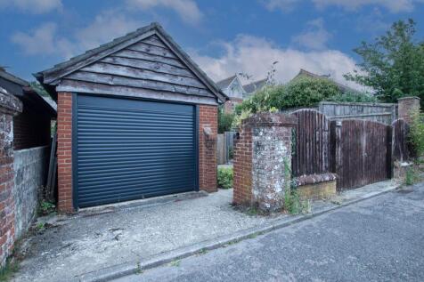 Garage and parking accessed from Vict...