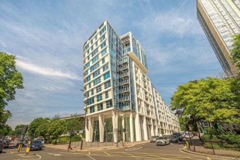 LONG LET. Finished to an excellent standard throughout, a sleek and modern 1 bedroom flat featuring a fabulous reception room with contemporary open-plan kitchen and access to balcony, set in a superb