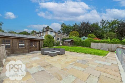 Rear Garden - Elevated Lawn and Seating Area