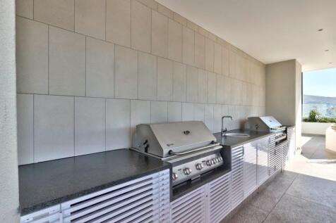 Rooftop terrace barbeque and entertainment area