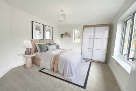 Light-filled main bedroom with plenty of space for bedroom furniture