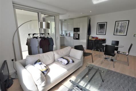 A beautifully presented two-bedroom, two-bathroom apartment with a private balcony, situated in Ferraro House within the highly sought-after Elephant Park development.