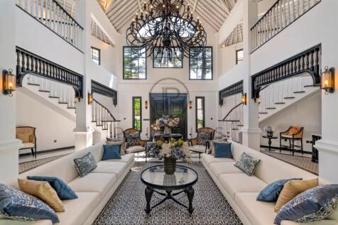 Elegant and spacious two-story living room with hi