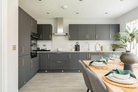 A modern kitchen & dining area with ample storage