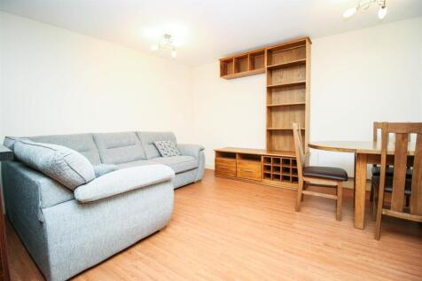 A stylish two bedroom two bathroom, ground floor apartment offering contemporary open-plan accommodation which benefits from fantastic views, a building manager and an underground secure parking space