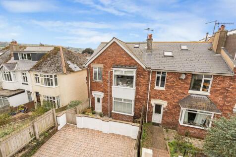 Front of house with 2 parking spaces