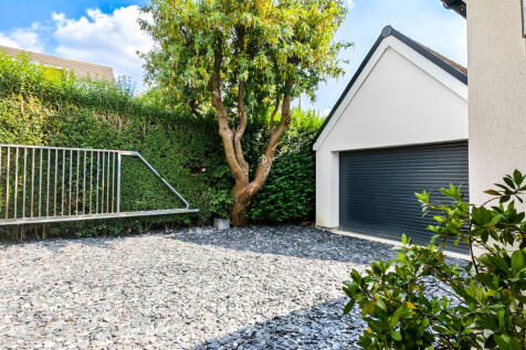 GRAVEL DRIVE AND GARAGE