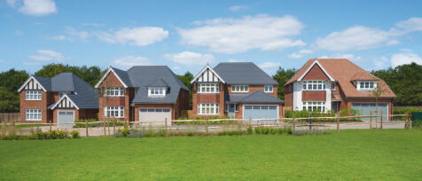 Redrow Paddock Green street scene of stylish premium detsched homes