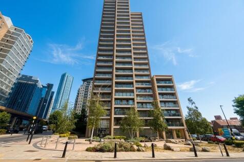 Bright 7th-floor 1-bed in Canary Wharf's Heritage Tower, with private balcony and open-plan kitchen-living space. Fully furnished with concierge and gym. Moments from Crossharbour DLR, Elizabeth Line