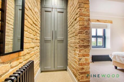 BEDROOM 1 - WALK IN DRESSING