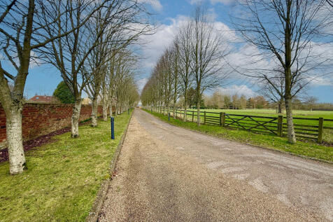 Lead Up To Gated Entrance To Property