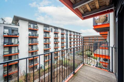 ZERO DEPOSIT AVAILABLE. LONG LET. This 1 bedroom 4th floor flat features a stylish red brick accent wall, a spacious open plan reception room with a modern finish and a private balcony.