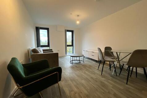 Available 16th October We are pleased to present this, two bedroom, two bathroom apartment with spacious living area, modern kitchen with matt units and wood effect work surface, integrate...