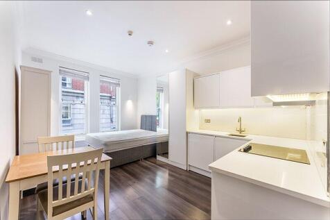 First floor furnished studio apartment benefiting from wooden floors throughout, modern kitchen, built-in wardrobes with shared bathroom facilities(three bathrooms and a separate wc shared in between