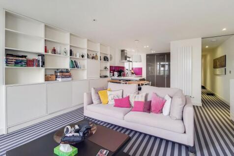 LONG LET. Presenting an enviable position moments from the Thames, this 1 bedroom apartment offers comfortable accommodation and ample sunlight. It showcases an open-plan layout and modern finishes, a