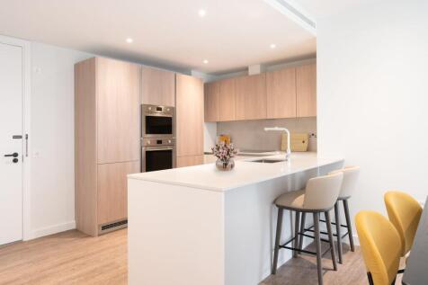 Savor the elegance of this contemporary kitchen, designed for both style and functionality.