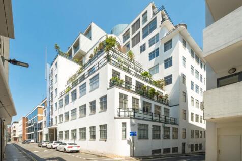 Set within the iconic Ziggurat Building on Saffron Hill, this impressive two bedroom, two bathroom warehouse loft offers over 950 sq ft of living space in the heart of Clerkenwell.