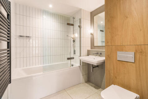 Experience elegance in this beautifully designed bathroom, where modern meets comfort.