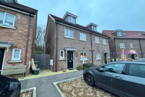 This beautifully presented and spacious three-sto