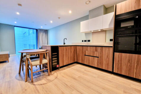 Stylish one-bedroom apartment at One Eastside offering contemporary city living. Featuring floor to ceiling windows, a sleek kitchen with integrated Samsung appliances and a spa-inspired bathroom. Res