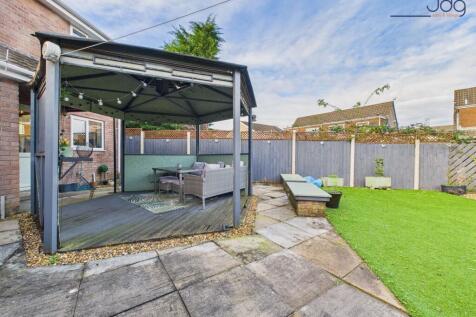Spacious North rear garden with patio, easy-care lawn & covered gazebo entertaining area