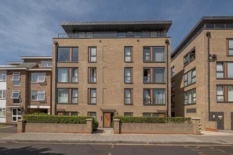 Stunning contemporary apartment finished to a high specification in prestigious development within walking distance of town centre and station.
