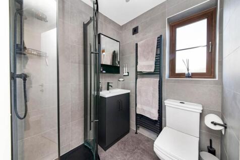 BEDROOM ONE EN-SUITE SHOWER ROOM